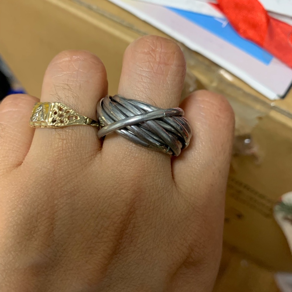Silver Ring. It was given to me by my cousin but I have never used it.